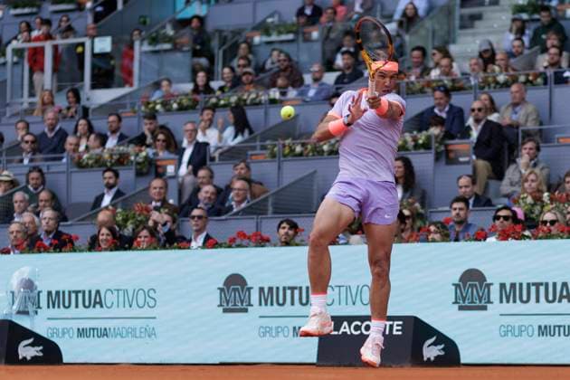 MADRID, SPAIN - APRIL 25:Rafael Nadal returns a shot against Darwin Blanch during their match on Day 4 of the Mutua Madrid Open at Caja Magica Stadium in Madrid. ONLYxEDITORIALxUSAGE  (251251917)