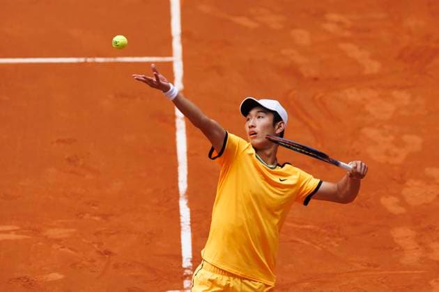 MADRID, SPAIN - APRIL 26:Juncheng Shang returns the ball against Alejandro Davidovich during their match on Day 5 of the Mutua Madrid Open at Caja Magica Stadium in Madrid. ONLYxEDITORIALxUSAGE  (251343639)