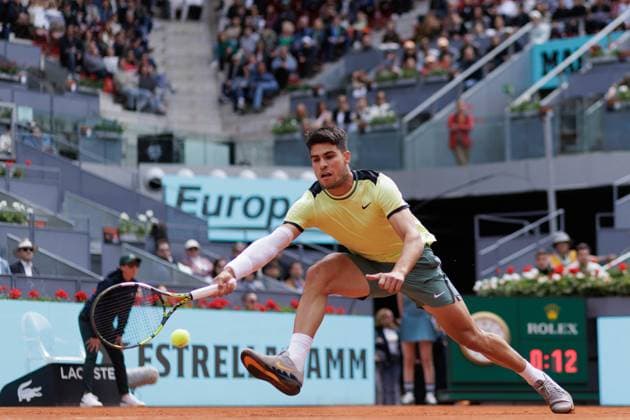 April 26, 2024, Madrid, Spain: Carlos Alcaraz plays against Alexander Shevchenko (not pictured) during their match on Day 5 of the Mutua Madrid Open at Caja Magica Stadium. Carlos Alcaraz won 6-2 , 6-1 Madrid Spain - ZUMAs197 20240426_aaa_s197_080 Copyright: xGuillermoxMartinezx
