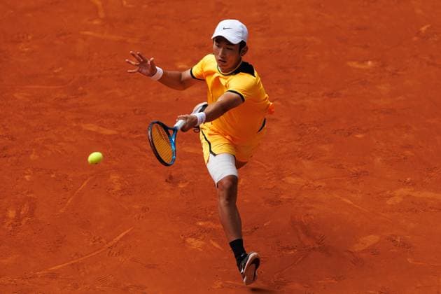 April 26, 2024, Madrid, Spain: Juncheng Shang plays against Alejandro Davidovich (not pictured) during their match on Day 5 of the Mutua Madrid Open at Caja Magica Stadium. Alejandro Davidovich won 7 -5, 6-3 Madrid Spain - ZUMAs197 20240426_aaa_s197_098 Copyright: xGuillermoxMartinezx