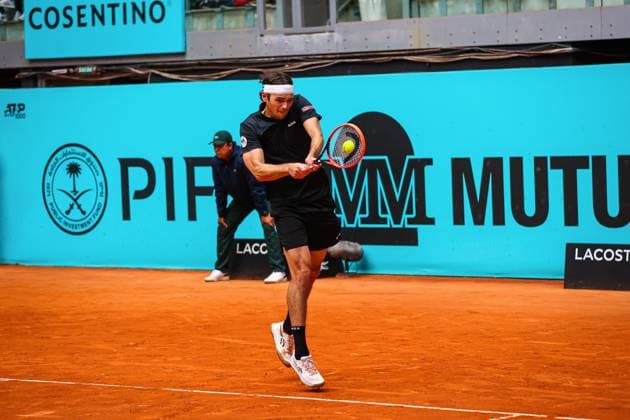 April 26, 2024, Madrid, Spain: Taylor Fritz of the USA plays against Luciano Darderi of Italy on Day Five of the Mutua Madrid Open 2024 tournament at La Caja Magica. Taylor Fritz won against Luciano Darderi 7-6, 6-4 Madrid Spain - ZUMAs197 20240426_aaa_s197_189 Copyright: xMiguelxReisx