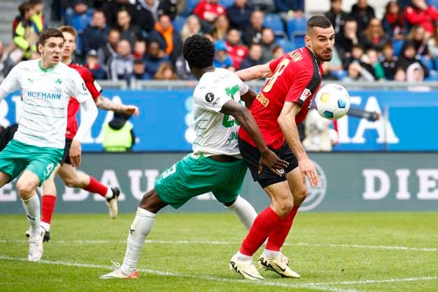 28.04.2024, xavx, Fussball 2.Bundesliga, SV Wehen Wiesbaden - SpVgg Greuther Fuerth emspor, v.l. Gideon Jung (SpVgg Greuther Fürth), Ivan Prtajin (SV Wehen Wiesbaden) (DFL DFB REGULATIONS PROHIBIT ANY USE OF PHOTOGRAPHS as IMAGE SEQUENCES and or QUASI-VIDEO) Wiesbaden