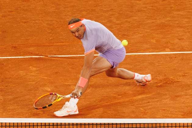 Mutua Madrid Open - Rafael Nadal vs Jiri Lehecka MADRID, SPAIN - APRIL 30 Rafael Nadal returns a shot against Jiri Lehecka during their match on Day 9 of the Mutua Madrid Open at Caja Magica Stadium in Madrid. (Photo by Guillermo Martinez) Madrid Caja Magica Spain Copyright: xGuillermoxMartinezx