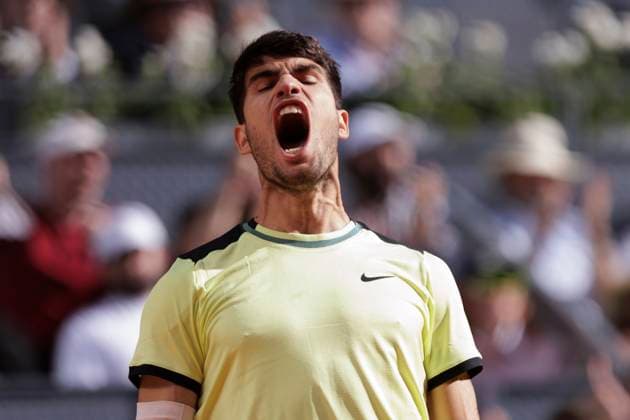 MADRID, SPAIN - APRIL 30: Carlos Alcaraz celebrates against Jan-Lennard Struff during their match on Day 9 of the Mutua Madrid Open at Caja Magica Stadium in Madrid. ONLYxEDITORIALxUSAGE  (251769004)