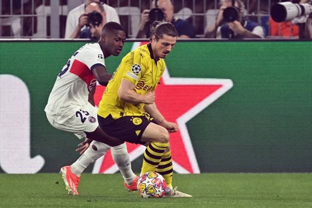 01.05.2024, xjrdrx, Fussball UEFA Champions League, Borussia Dortmund - Paris St.Germain emspor, v.l. Nuno Mendes (PSG Paris St.Germain), Marcel Sabitzer (Borussia Dortmund) (DFL DFB REGULATIONS PROHIBIT ANY USE OF PHOTOGRAPHS as IMAGE SEQUENCES and or QUASI-VIDEO) Dortmund