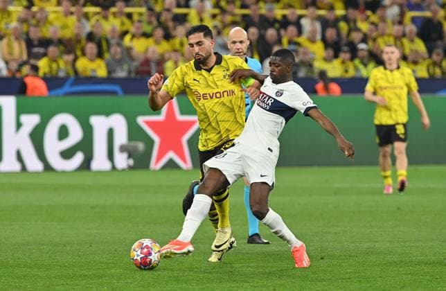 01.05.2024, xjrdrx, Fussball UEFA Champions League, Borussia Dortmund - Paris St.Germain emspor, v.l. Emre Can (Borussia Dortmund), Ousame Dembele (PSG Paris St.Germain) (DFL DFB REGULATIONS PROHIBIT ANY USE OF PHOTOGRAPHS as IMAGE SEQUENCES and or QUASI-VIDEO) Dortmund