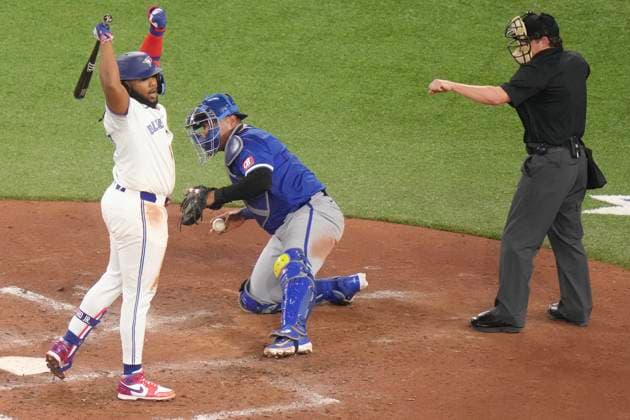 May 1, 2024, Toronto, On, CAN: Toronto Blue Jays Vladimir Guerrero Jr. reacts as he strikes out in front of Kansas City Royals catcher Salvador Perez during sixth inning American League MLB, Baseball Herren, USA baseball action in Toronto on Wednesday, May 1, 2024. Vladimir Guerrero Jr.; Salvador Perez  - ZUMAc35_ 20240501_zaf_c35_141 Copyright: xChrisxYoungx