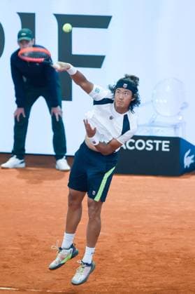 (240502) -- MADRID, May 2, 2024 -- Zhang Zhizhen serves during the men s doubles second round match between Zhang Zhizhen of China Aslan Karatsev of Russia and Andrea Vavassori Simone Bolelli of Italy at the Madrid Open tennis tournament in Madrid, Spain, May 1, 2024. (Photo by Xinhua) (SP)SPAIN-MADRID-TENNIS-MADRID OPEN-MEN S DOUBLES GustavoxValiente 