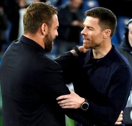 Daniele De Rossi coach of AS Roma and Xabi Alonso head coach of Bayer Leverkusen greet each other during the Europa League football match between AS Roma and Bayer Leverkusen at Olimpico stadium in Rome (Italy), May 2nd, 2024. AndreaxStaccioli