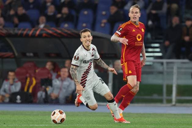 Football Europa League match - AS Roma vs Bayer 04 Leverkusen Rome, Italy 2.05.2024: Alejandro Grimaldo of Leverkusen , Rick Kasdorp of Roma during the UEFA Europa League 2023-2024, semi-finals leg 1, football match between AS Roma vs Bayer 04 Leverkusen FuSsball at Olympic Stadium in Rome. Rome Italy  Copyright: xIPAxSport ABACAx