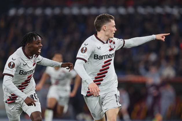 Football Europa League match - AS Roma vs Bayer 04 Leverkusen Rome, Italy 2.05.2024: Florian Wirtz of Leverkusene score the goal 0-1 and celebrate with the team during the UEFA Europa League 2023-2024, semi-finals leg 1, football match between AS Roma vs Bayer 04 Leverkusen FuSsball at Olympic Stadium in Rome. Rome Italy  Copyright: xIPAxSport ABACAx