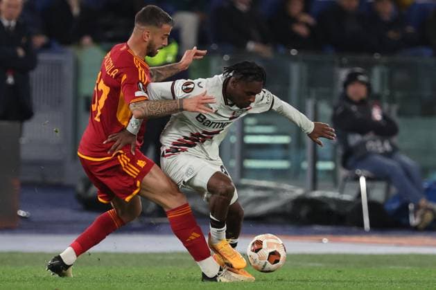 Football Europa League match - AS Roma vs Bayer 04 Leverkusen Rome, Italy 2.05.2024: Leonardo Spinazzola of Roma, Jeremie Frimpong of Leverkusen during the UEFA Europa League 2023-2024, semi-finals leg 1, football match between AS Roma vs Bayer 04 Leverkusen FuSsball at Olympic Stadium in Rome. Rome Italy  Copyright: xIPAxSport ABACAx