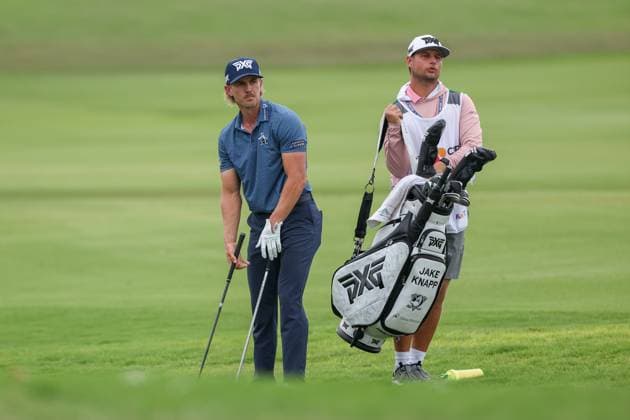 MCKINNEY, TX - MAY 03: Jake Knapp (USA) tries to pick a club for his second shot on the 18th hole during the second round of the PGA, Golf Herren CJ CUP Byron Nelson on May 3, 2024, at TPC Craig Ranch in McKinney, TX. (Photo by David Buono Icon Sportswire) GOLF: MAY 03 PGA CJ CUP Byron Nelson EDITORIAL USE ONLY Icon240503072