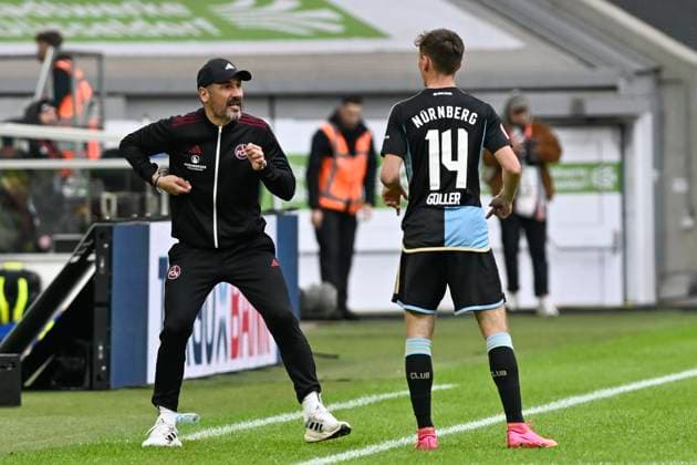 Cristian Fiel (Coch, 1.FC Nuernberg) instruiert Benjamin Goller ( 14, 1.FC Nuernberg) Gestik Geste gestikuliert 03.05.2024 Fussball Fortuna Duesseldorf vs 1. FC Nuernberg , Merkur Spiel-Arena, Duesseldorf, DFB DFL REGULATIONS PROHIBIT ANY USE OF PHOTOGRAPHS AS IMAGE SEQUENCES AND OR QUASI-VIDEO NRW Germany