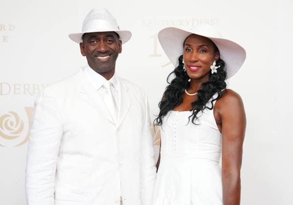 LOUISVILLE, KY - MAY 04: Basketball star Lisa Leslie and her husband Michael Lockwood walk the red carpet before the 150th running of the Kentucky Derby on May 4, 2024, at Churchill Downs in Louisville, Ky. (Photo by Jeff Moreland Icon Sportswire) HORSE RACING: MAY 04 Kentucky Derby EDITORIAL USE ONLY Icon168240504011