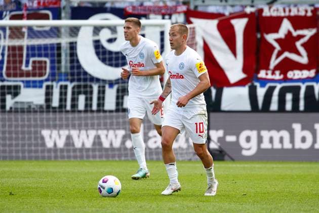 05.05.2024, xavx, Fussball 2.Bundesliga, SV Wehen Wiesbaden - Holstein Kiel emspor, v.l. Marko Ivezic (Holstein Kiel), Lewis Holtby (Holstein Kiel) (DFL DFB REGULATIONS PROHIBIT ANY USE OF PHOTOGRAPHS as IMAGE SEQUENCES and or QUASI-VIDEO) Wiesbaden
