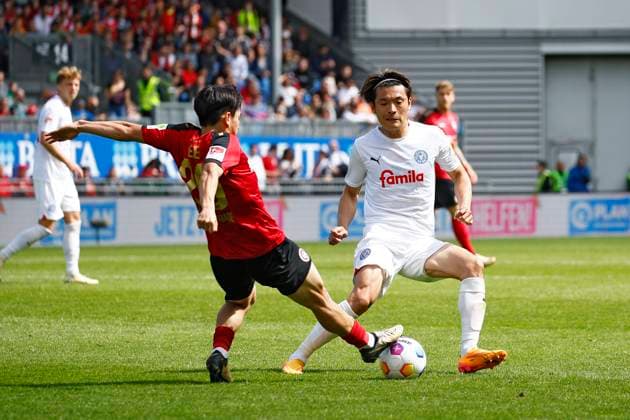 05.05.2024, xavx, Fussball 2.Bundesliga, SV Wehen Wiesbaden - Holstein Kiel emspor, v.l. Hyun-ju Lee (SV Wehen Wiesbaden), Shuto Machino (Holstein Kiel) (DFL DFB REGULATIONS PROHIBIT ANY USE OF PHOTOGRAPHS as IMAGE SEQUENCES and or QUASI-VIDEO) Wiesbaden