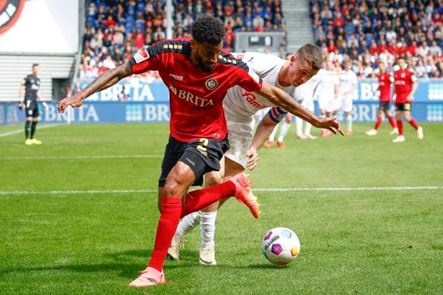 05.05.2024, xavx, Fussball 2.Bundesliga, SV Wehen Wiesbaden - Holstein Kiel emspor, v.l. Martin Angha (SV Wehen Wiesbaden), Philipp Sander (Holstein Kiel) (DFL DFB REGULATIONS PROHIBIT ANY USE OF PHOTOGRAPHS as IMAGE SEQUENCES and or QUASI-VIDEO) Wiesbaden