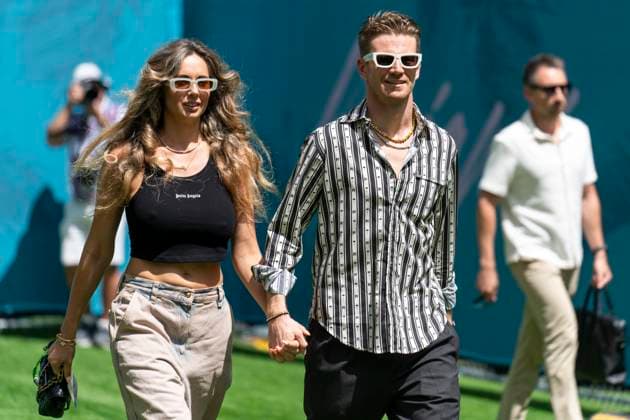 Egle Ruskyte and her husband German Formula One driver Nico Hulkenberg of Haas F1 Team arrive in the paddock during the Formula One Miami Grand Prix at the Miami International Autodrome in Miami Gardens, Florida on Sunday, May 5, 2024  MIA20240505411 GREGxNASH