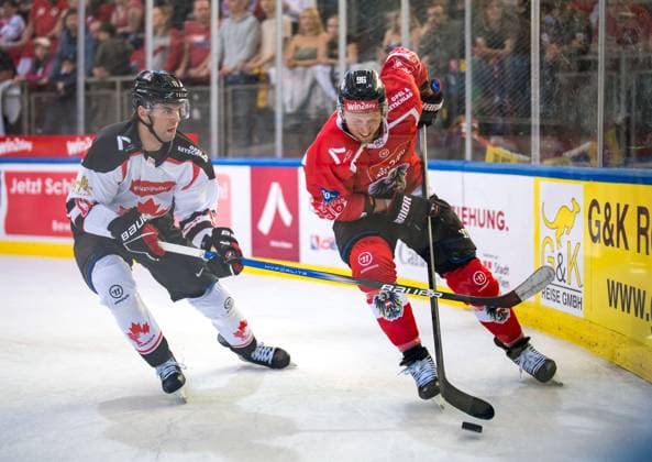 Ice hockey, Eishockey - AUT vs CAN, test match VIENNA,AUSTRIA,05.MAY.24 - ICE HOCKEY - OEEHV international test match, men, Austria vs Canada. Image shows Adam Fantilli (CAN) and Mario Huber (AUT).  GEPAxpictures xEdgarxEisner