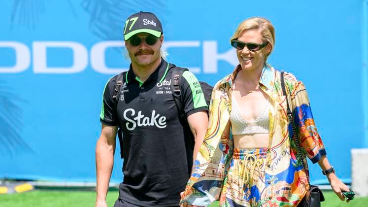 5th May 2024; Miami International Autodrome, Miami, Florida, USA; Formula 1 Crypto.com Miami Grand Prix 2024; Race Day; Stake F1 Team Kick Sauber driver Valtteri Bottas of Finland and his girlfriend Tiffany Cromwell arrive in the Team Village before the start of the Miami Grand Prix  ActionPlus12639182 DouglasxMurray