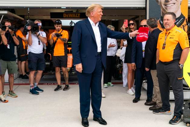 Former U.S. President Donald Trump visits the garage of McLaren F1 Team with team principal Zak Brown during the Formula One Miami Grand Prix at the Miami International Autodrome in Miami Gardens, Florida on Sunday, May 5, 2024  MIA20240505423 GREGxNASH