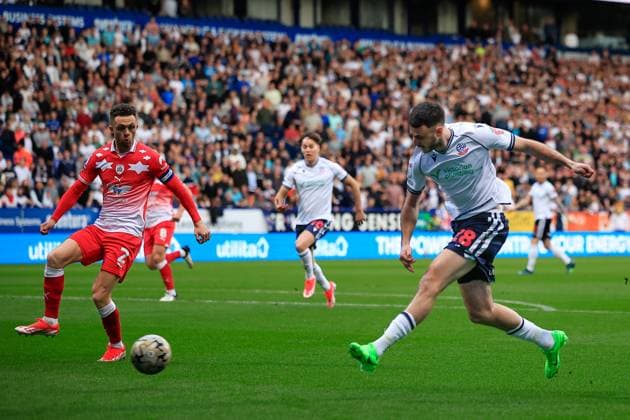 Bolton Wanderers v Barnsley EFL Sky Bet League 1 07 05 2024. Play Off Leg 2 of 2 Aaron Collins (28) of Bolton Wanderers shoots on goal during the EFL Sky Bet League 1 play-off second leg match between Bolton Wanderers and Barnsley at the Toughsheet Community Stadium, Bolton, England on 7 May 2024. Bolton Toughsheet Community Stadium Greater Manchester England Editorial use only DataCo restrictions apply See www.football-dataco.com , Copyright: xConorxMolloyx PSI-19625-0022