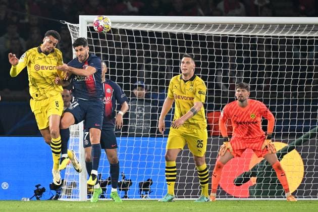 Paris, Parc des Princes, 07.05.24, GER, Herren, UEFA Champions League, Halbfinale, Saison 2023-2024, Paris Saint Germain - Borussia Dortmund Bild: v.li. im Zweikampf Felix NMECHA (Dortmund) und Marco ASENSIO (Paris) im Kopfball, Kopfballduell Only for editorial use! UEFA regulations prohibit any use of photographs as image sequences and or quasi-video. Frankreich
