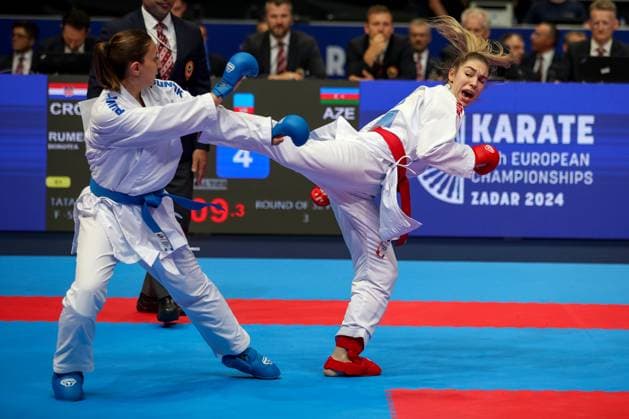 Sport Themen der Woche KW19 59th European Senior Karate Championship - Day 2 Dorotea Rumenjak (red) of Croatia and Madina Sadigova (blue) of Azerbaijan compete during the -55 kg Female Kumite category Main Tree Pool 3 - Round 1 match of 59th European Senior Karate Championship at Kresimir Cosic Hall on May 9, 2024 in Zadar, Croatia. SimexZelic PIXSELL