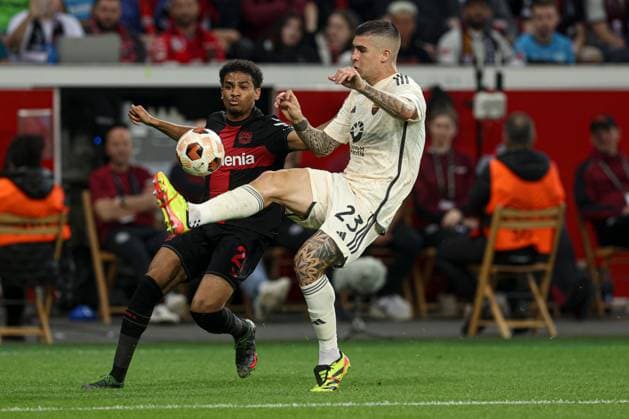 Amine Adli of Bayer Leverkusen and Gianluca Mancini of Roma Bayer 04 Leverkusen v Roma, UEFA Europa League, Semi Final, Second Leg Football, BayArena, Leverkusen, Germany - 09 May 2024 EDITORIAL USE ONLY No use with unauthorised audio, video, data, fixture lists, club league logos or live services. Online in-match use limited to 120 images, no video emulation. No use in betting, games or single club league player publications. Copyright: xPaulxCurrie Shutterstockx 14470736an