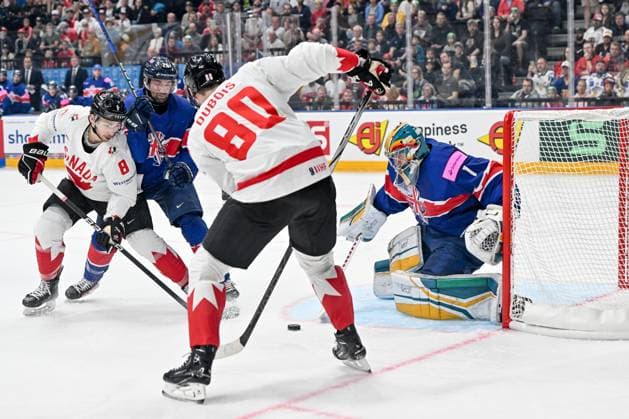 PRAGUE, CZECH REPUBLIC - MAY 11: Michael Bunting of Canada (L) battles for the puck against Evan Mosey of Great Britain and goalkeeper Jackson Whistle of Great Britain during the preliminary round match between Great Britain and Canada at Prague Arena on May 11, 2024 in Prague, Czech Republic. Prague Prague Arena Czech Republic Copyright: xJustPictures.ch AndreaxBrancax jp-en-EuSpIm-AB_11052024_AAB_4205