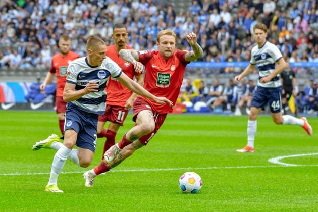 11.05.2024, xlakx, Fussball 2.Bundesliga, Hertha BSC Berlin - 1.FC Kaiserslautern emspor, v.l. Palko Dardai (Hertha BSC 27),Tymoteusz Puchaz (1.FC Kaiserslautern 15),Zweikampf, Duell, Kampf, tackle (DFL DFB REGULATIONS PROHIBIT ANY USE OF PHOTOGRAPHS as IMAGE SEQUENCES and or QUASI-VIDEO) Daniel Lakomski Jan Huebner Berlin
