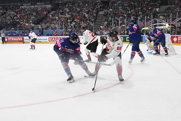 Great Britain vs Canada group A match of the 2024 IIHF World Championship, WM, Weltmeisterschaft in Prague, Czech Republic, on May 11, 2024. From left Cam Critchlow of Great Britain, Andrew Mangiapane of Canada. (CTKxPhoto MichalxKamaryt) CTKPhotoP2024051102648  CTKPhotoP2024051102648