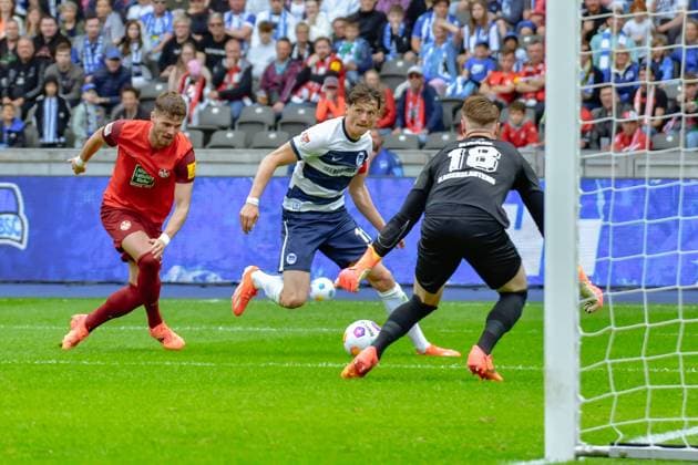 11.05.2024, xlakx, Fussball 2.Bundesliga, Hertha BSC Berlin - 1.FC Kaiserslautern emspor, v.l. Jan Elvedi (1.FC Kaiserslautern 33),Fabian Reese (Hertha BSC 11),Julian Krahl (1.FC Kaiserslautern 18),Zweikampf, Duell, Kampf, tackle (DFL DFB REGULATIONS PROHIBIT ANY USE OF PHOTOGRAPHS as IMAGE SEQUENCES and or QUASI-VIDEO) Daniel Lakomski Jan Huebner Berlin