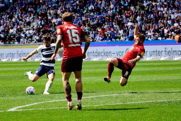 JonJoe Kenny (Hertha BSC, 16), Tymoteusz Puchacz (1. FC Kaiserslautern, 15), Jean Zimmer (1. FC Kaiserslautern, 08), GER, Hertha BSC vs. 1. FC Kaiserslautern, Fussball Herren, 2. Bundesliga, Saison 2023 2024, 33. Spieltag, 11.05.2024. (DFL REGULATIONS PROHIBIT ANY USE OF PHOTOGRAPHS AS IMAGE SEQUENCES AND OR QUASI - VIDEO). GER, Hertha BSC vs. 1. FC Kaiserslautern, Fussball Herren, 2. Bundesliga, Saison 2023 2024, 33. Spieltag, 11.05.2024. Berlin