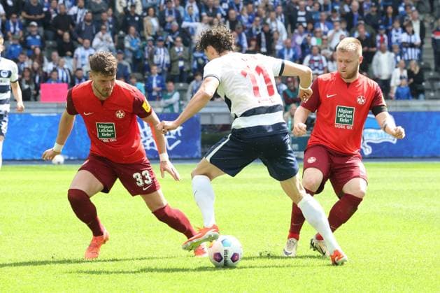 DEU, DFL, 2. FBL, Hertha BSC vs. 1.FC Kaiserslautern, 11.05.2024, Berliner Olympiastadion, Berlin, DEU, DFL, 2. FBL, Hertha BSC vs. 1.FC Kaiserslautern, im Bild Fabian Reese (Hertha BSC Berlin 11), Jan Elvedi (1.FC Kaiserslautern 33), Jean Zimmer (1.FC Kaiserslautern 8) DFL - regulations prohibit any use of Photographs as image sequences and or quasi-video Foto: Juergen Engler nordphoto GmbH