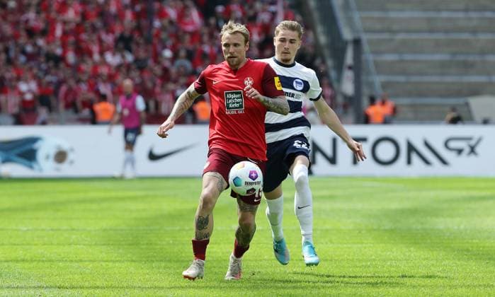 Tymoteusz Puchacz im Zweikampf mit Marten Winkler Fußball Fussball DFL 2.Bundesliga Herren 33.Spieltag Saison 2023 2024 11.05.2024 Hertha BSC Berlin vs. 1.FC Kaiserslautern FCK DFL regulations prohibit any use of photographs as image sequences and or quasi-video