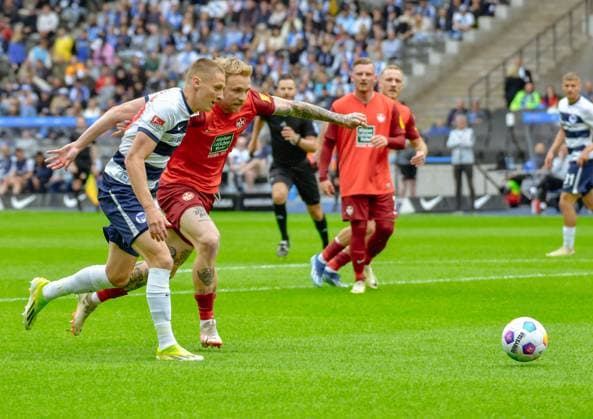11.05.2024, xlakx, Fussball 2.Bundesliga, Hertha BSC Berlin - 1.FC Kaiserslautern emspor, v.l. Palko Dardai (Hertha BSC 27),Tymoteusz Puchaz (1.FC Kaiserslautern 15),Zweikampf, Duell, Kampf, tackle (DFL DFB REGULATIONS PROHIBIT ANY USE OF PHOTOGRAPHS as IMAGE SEQUENCES and or QUASI-VIDEO) Daniel Lakomski Jan Huebner Berlin