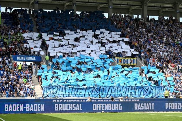 12.05.2024, xjhx, Fussball 2.Bundesliga, Karlsruher SC - Hannover 96 emspor, v.l. Fans Zuschauer Ultras Besucher Stimmung Schals Trikots Karlsruher SC Choreographie (DFL DFB REGULATIONS PROHIBIT ANY USE OF PHOTOGRAPHS as IMAGE SEQUENCES and or QUASI-VIDEO) Karlsruhe