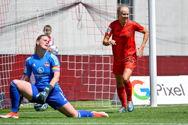 v.li.: Amelie Thöle (Nürnberg, 12) geschlagen, enttäuscht schauend, Enttäuschung, Frustration, disappointed, pessimistisch, Pernille Harder (FC Bayern München, FCB, 21) mit Torjubel, Jubel, Torjubel, Torerfolg, celebrate the goal, goal, celebration, Jubel ueber das Tor zum 2:0 durch Pernille Harder (FC Bayern München, FCB, 21), optimistisch, Action, Aktion, 12.05.2024, München (Deutschland), Fussball, Google Pixel Frauen-Bundesliga, FC Bayern München - 1. FC Nürnberg, DFB DFL REGULATIONS PROHIBIT ANY USE OF PHOTOGRAPHS AS IMAGE SEQUENCES AND OR QUASI-VIDEO.