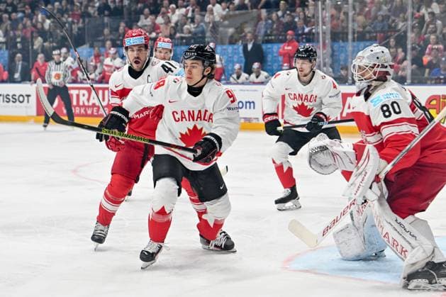 PRAGUE, CZECH REPUBLIC - MAY 12: Connor Bedard of Canada in action against Jesper Jensen Aabo of Denmark (L) and goalkeeper Frederik Dichow of Denmark (R) during the preliminary round match between Denmark and Canada at Prague Arena on May 12, 2024 in Prague, Czech Republic. Prague Prague Arena Czech Republic Copyright: xJustPictures.ch AndreaxBrancax jp-en-EuSpIm-AB_12052024_AAB_0204