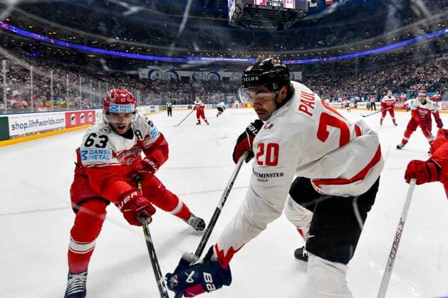 PRAGUE, CZECH REPUBLIC - MAY 12: Nick Paul of Canada battles for the puck against Patrick Russell of Denmark during the preliminary round match between Denmark and Canada at Prague Arena on May 12, 2024 in Prague, Czech Republic. Prague Prague Arena Czech Republic Copyright: xJustPictures.ch AndreaxBrancax jp-en-EuSpIm-AB_12052024_DSC_8943