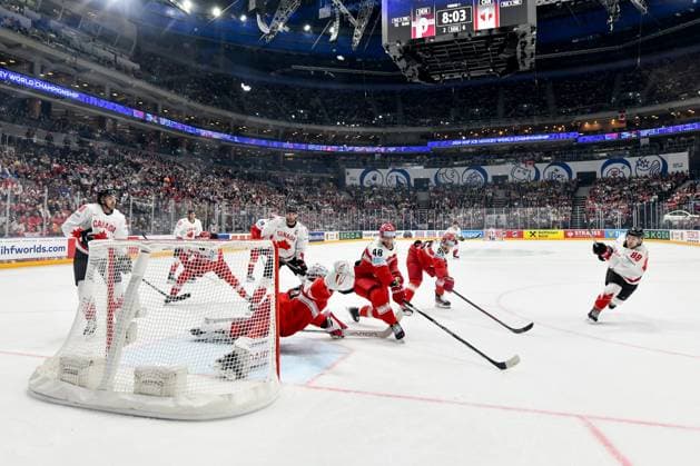 PRAGUE, CZECH REPUBLIC - MAY 12: Andrew Mangiapane of Canada (R) shoots the puck during the preliminary round match between Denmark and Canada at Prague Arena on May 12, 2024 in Prague, Czech Republic. Prague Prague Arena Czech Republic Copyright: xJustPictures.ch AndreaxBrancax jp-en-EuSpIm-AB_12052024_DSC_9024