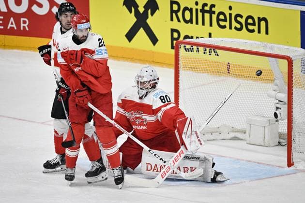 Denmark vs Canada group A match of the 2024 IIHF World Championship, WM, Weltmeisterschaft in Prague, Czech Republic, on May 12, 2024. From left Nick Paul of Canada, Markus Lauridsen of Denmark, Frederik Dichow - goalie of Denmark receives goal. (CTKxPhoto VitxSimanek) CTKPhotoP2024051204514  CTKPhotoP2024051204514