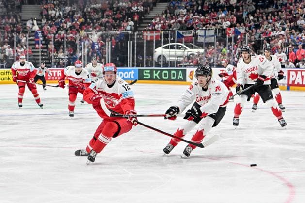 PRAGUE, CZECH REPUBLIC - MAY 12: Oscar Moelgaard of Denmark (L) in action against Damon Severson of Canada (R) during the preliminary round match between Denmark and Canada at Prague Arena on May 12, 2024 in Prague, Czech Republic. Prague Prague Arena Czech Republic Copyright: xJustPictures.ch AndreaxBrancax jp-en-EuSpIm-AB_12052024_AAB_0946