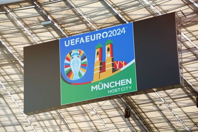 Munich, Bavaria, Germany - 13 May 2024: Scoreboard in the Allianz Arena with the UEFA EURO, EM, Europameisterschaft,Fussball 2024 (European Football Championship) logo and the words Munich Host City, symbolizing the venue