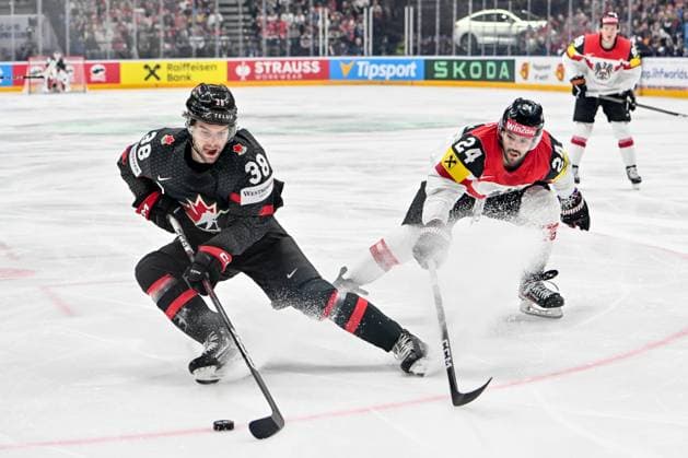 PRAGUE, CZECH REPUBLIC - MAY 14: Brandon Hagel of Canada protects the puck from Steven Strong of Austria during the preliminary round match between Canada and Austria at Prague Arena on May 14, 2024 in Prague, Czech Republic. Prague Czech Republic Copyright: xJustPictures.ch AndreaxBrancax jp-en-EuSpIm-AB_14052024_AAB_8227