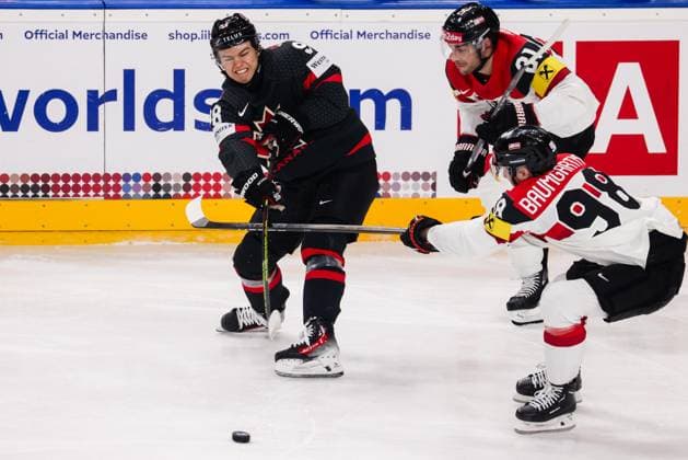 Ice hockey, Eishockey - IIHF WC 2024 PRAGUE,CZECH REPUBLIC,14.MAY.24 - ICE HOCKEY - IIHF Ice Hockey World Championship, WM, Weltmeisterschaft 2024, group stage, Austria vs Canada. Image shows Connor Bedard (CAN), Lukas Haudum and Benjamin Baumgartner (AUT).  GEPAxpictures xDanielxGoetzhaber