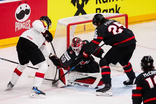 Ice hockey, Eishockey - IIHF WC 2024 PRAGUE,CZECH REPUBLIC,14.MAY.24 - ICE HOCKEY - IIHF Ice Hockey World Championship, WM, Weltmeisterschaft 2024, group stage, Austria vs Canada. Image shows Thomas Raffl (AUT), Jordan Binnington and Owen Power (CAN).  GEPAxpictures xDanielxGoetzhaber