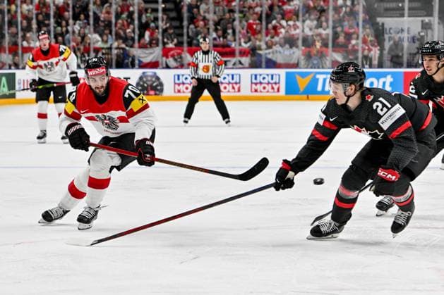PRAGUE, CZECH REPUBLIC - MAY 14: Benjamin Nissner of Austria shoots the puck against Kaiden Guhle of Canada during the preliminary round match between Canada and Austria at Prague Arena on May 14, 2024 in Prague, Czech Republic. Prague Czech Republic Copyright: xJustPictures.ch AndreaxBrancax jp-en-EuSpIm-AB_14052024_AAB_9253